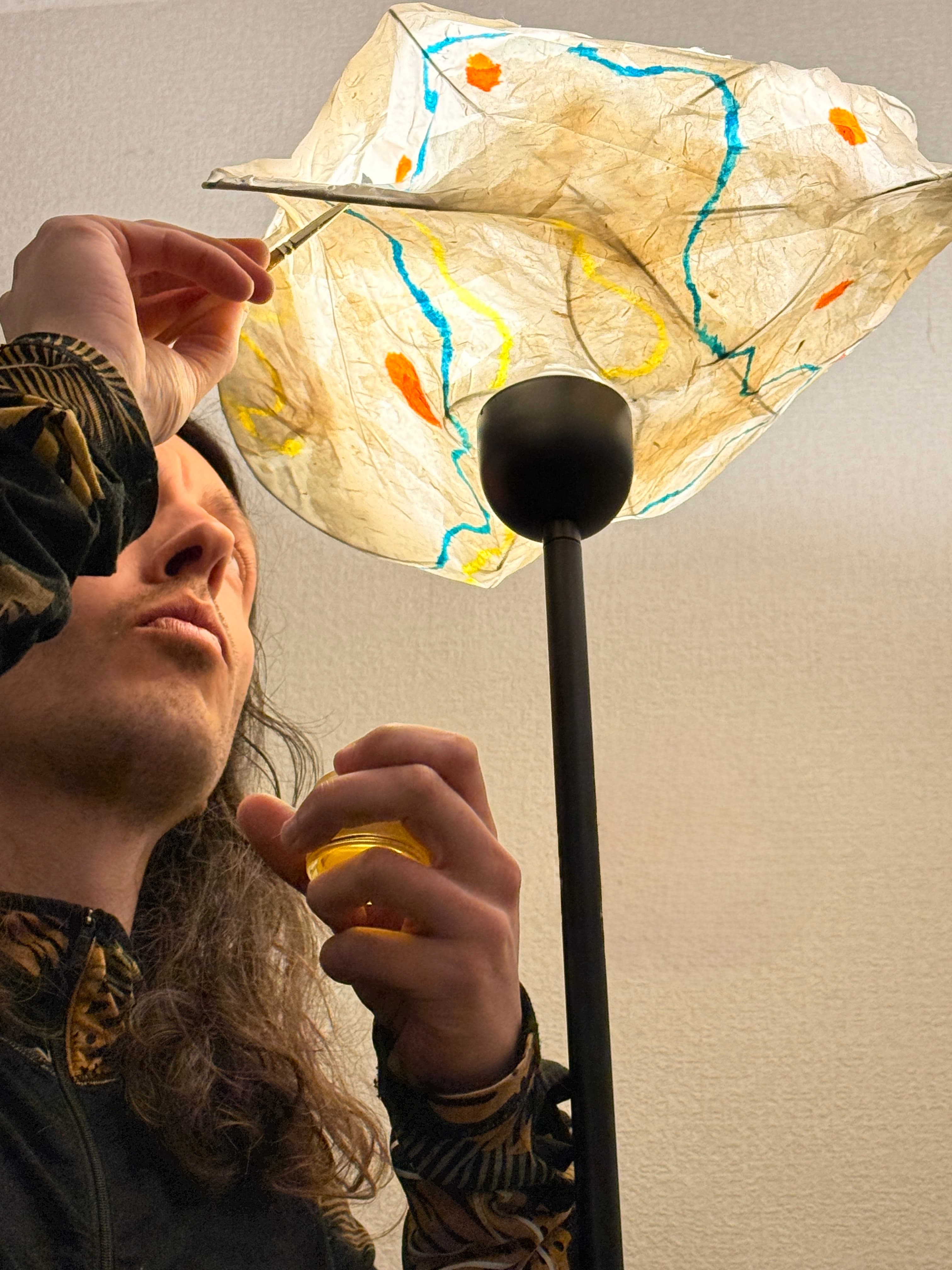 Painting a lampshade at the lodge.