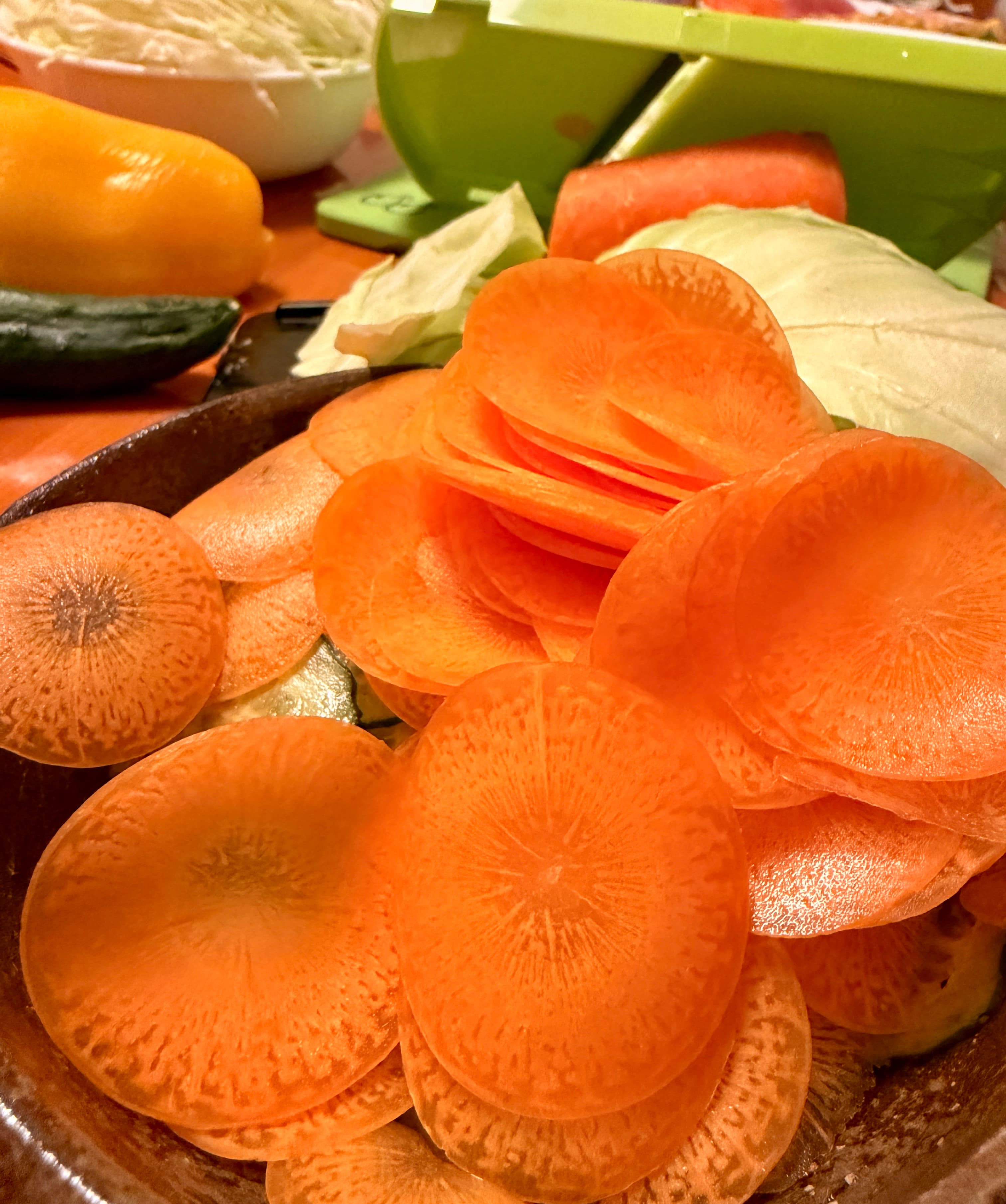 Fresh vegetables being prepared in the kitchen.