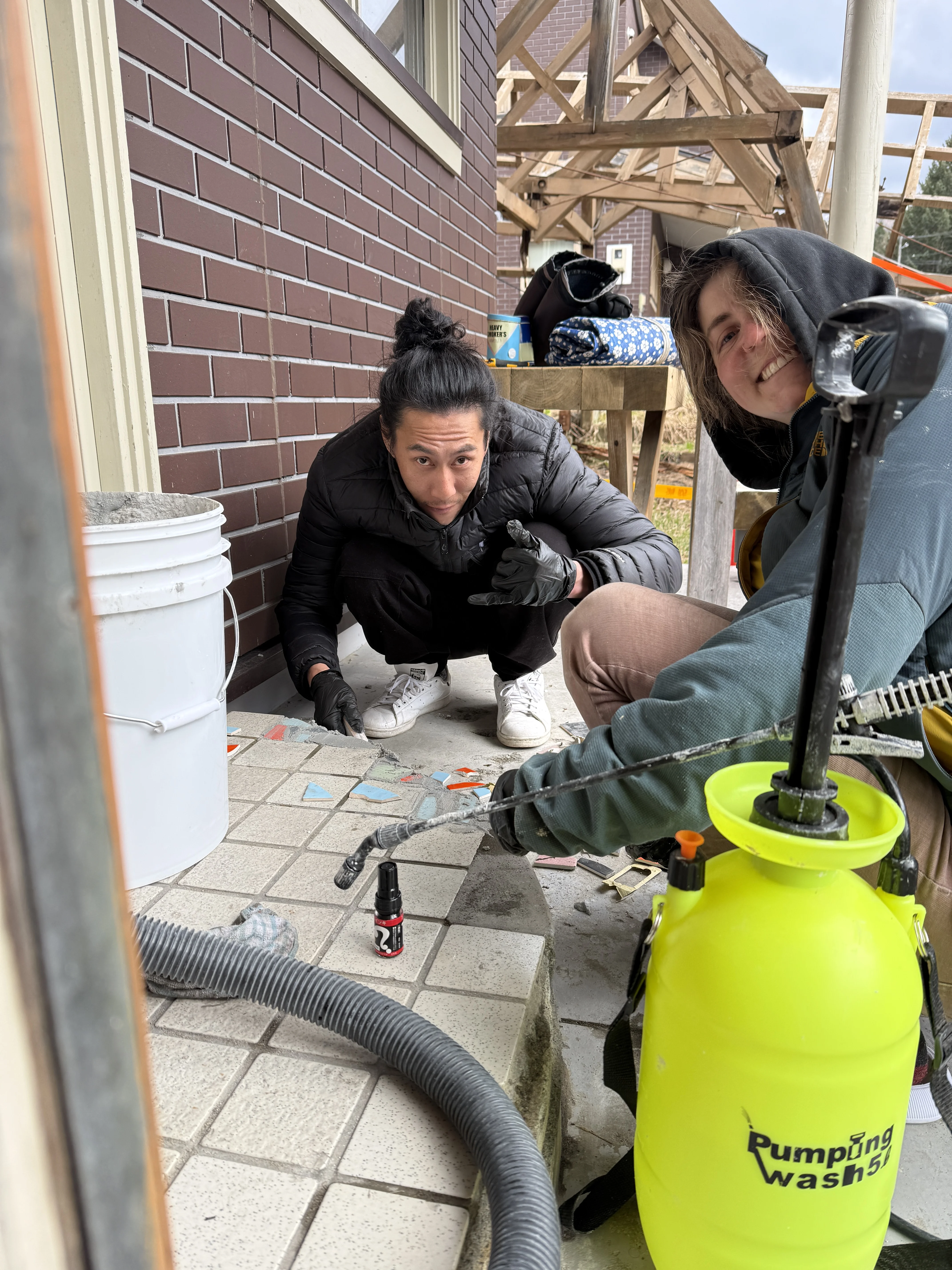 mosaic tile work on the front porch with friends
