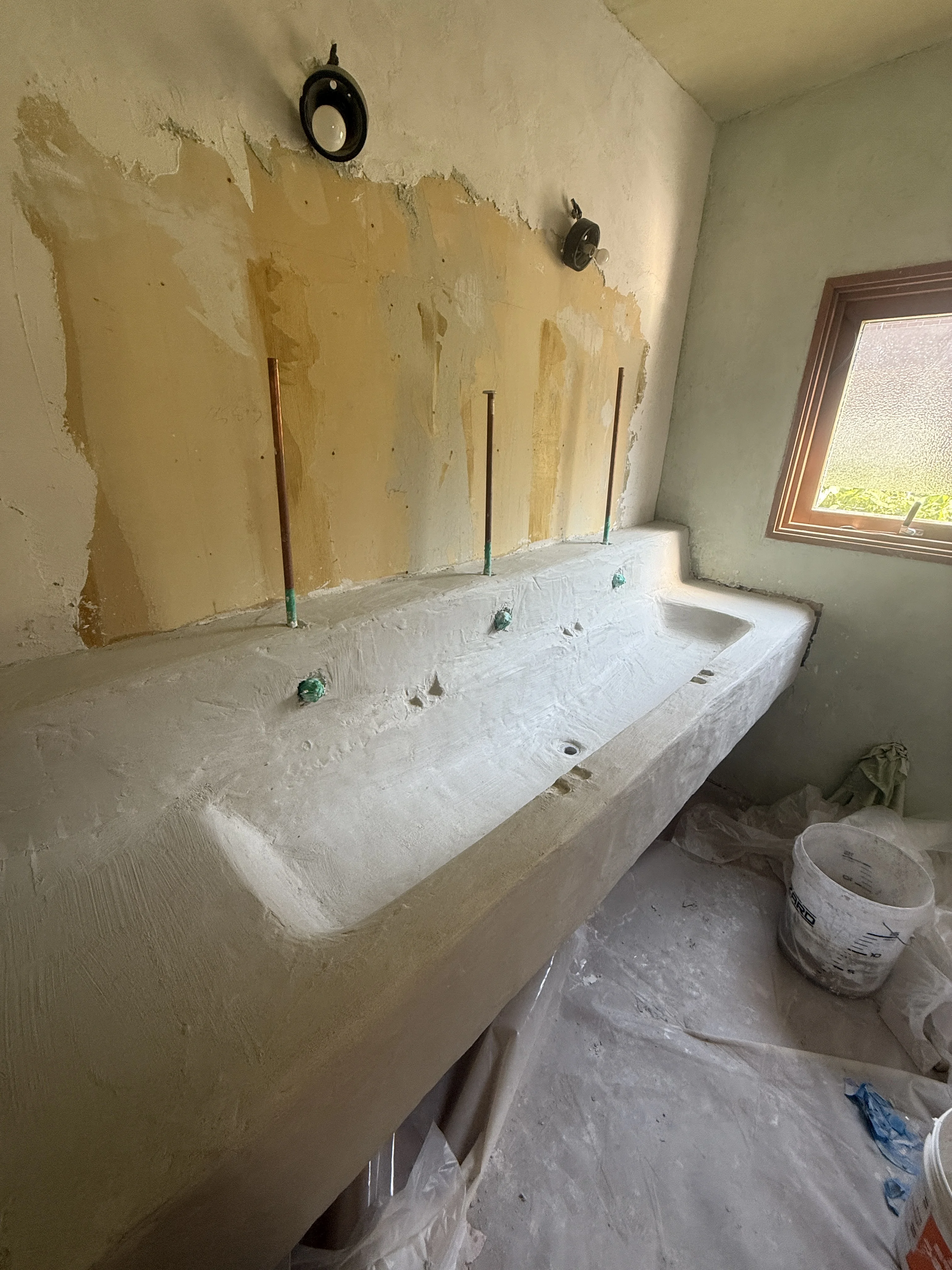 last shaping layer on the custom trough sink